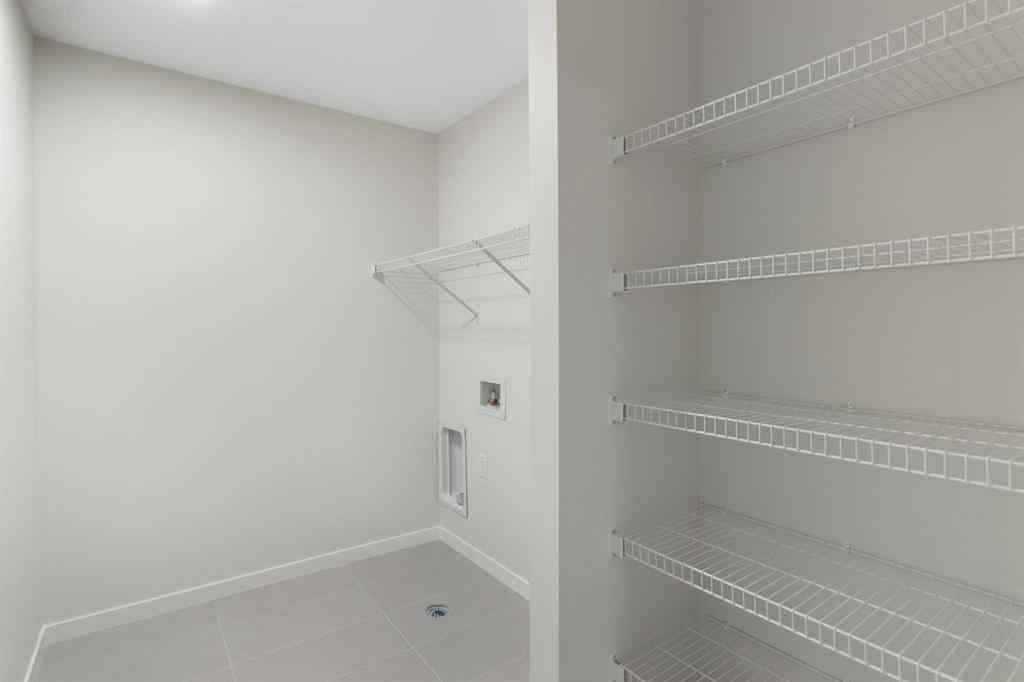 MLS® A2263502 - 164 Belmont Place SW in Belmont Calgary, Residential