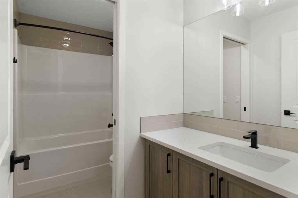 MLS® A2263502 - 164 Belmont Place SW in Belmont Calgary, Residential