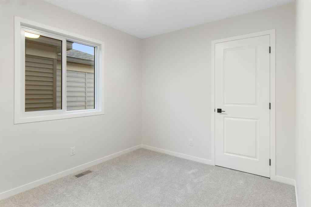 MLS® A2263502 - 164 Belmont Place SW in Belmont Calgary, Residential