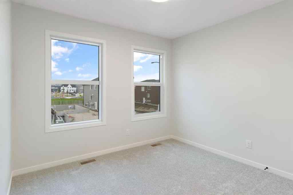 MLS® A2263502 - 164 Belmont Place SW in Belmont Calgary, Residential