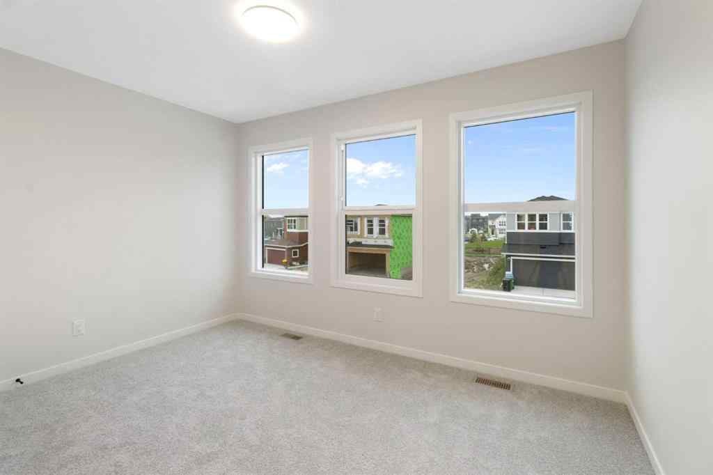 MLS® A2263502 - 164 Belmont Place SW in Belmont Calgary, Residential