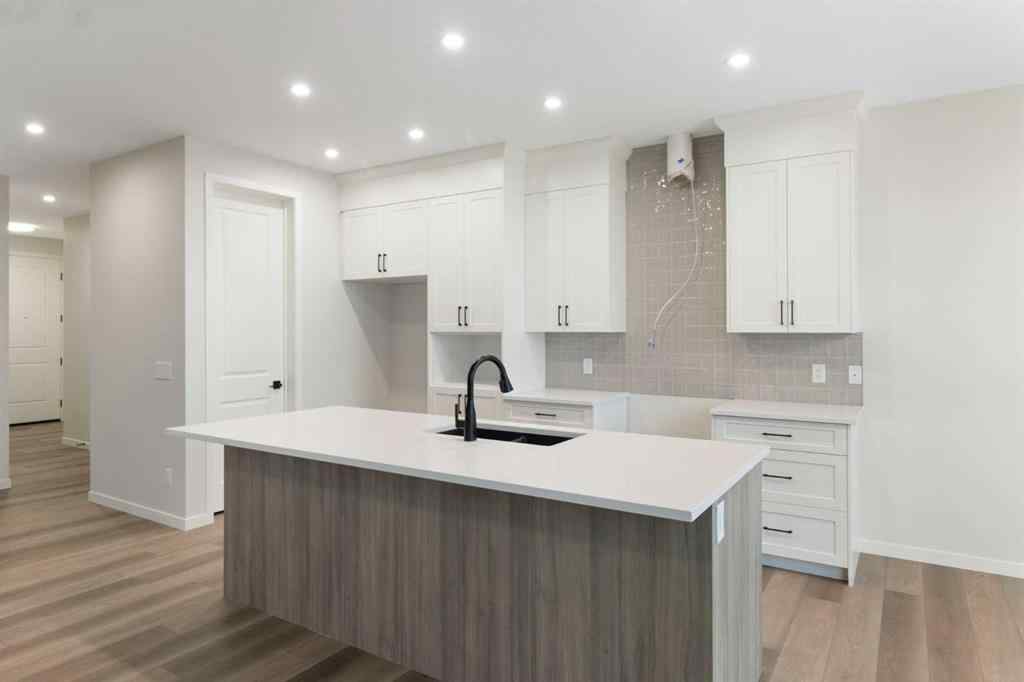 MLS® A2263502 - 164 Belmont Place SW in Belmont Calgary, Residential