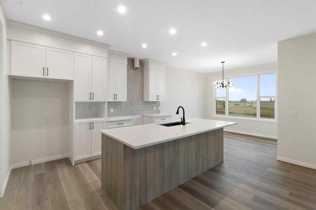 MLS® A2263502 - 164 Belmont Place SW in Belmont Calgary, Residential