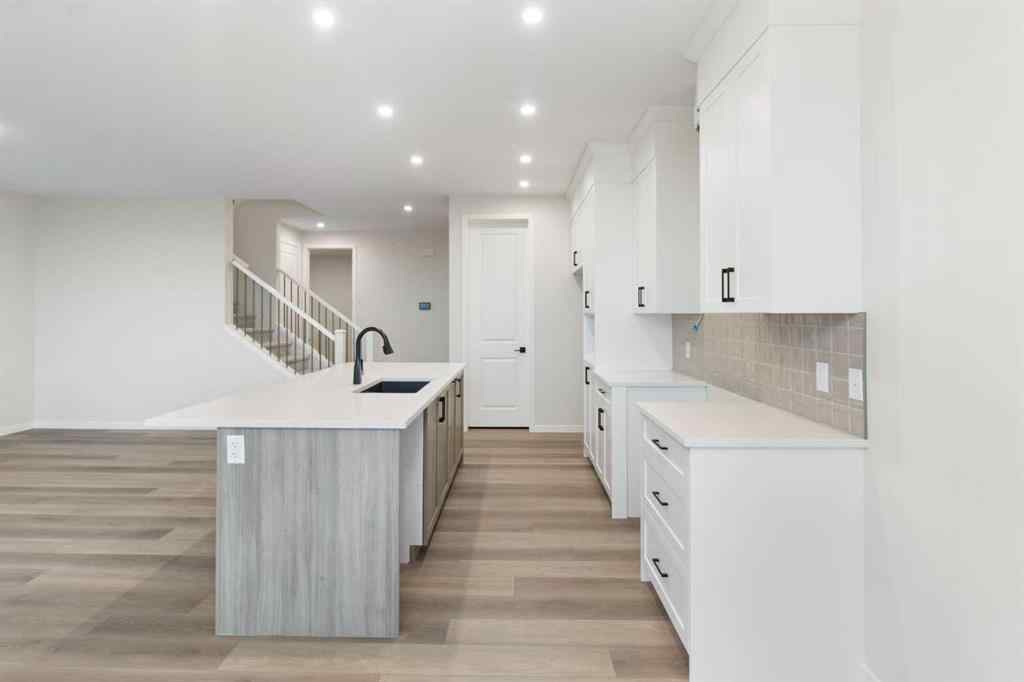 MLS® A2263502 - 164 Belmont Place SW in Belmont Calgary, Residential