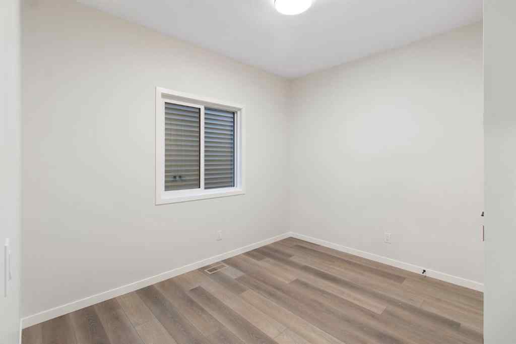 MLS® A2263502 - 164 Belmont Place SW in Belmont Calgary, Residential