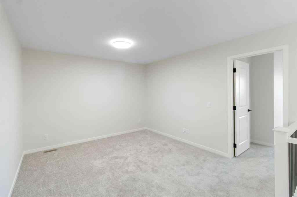 MLS® A2263502 - 164 Belmont Place SW in Belmont Calgary, Residential