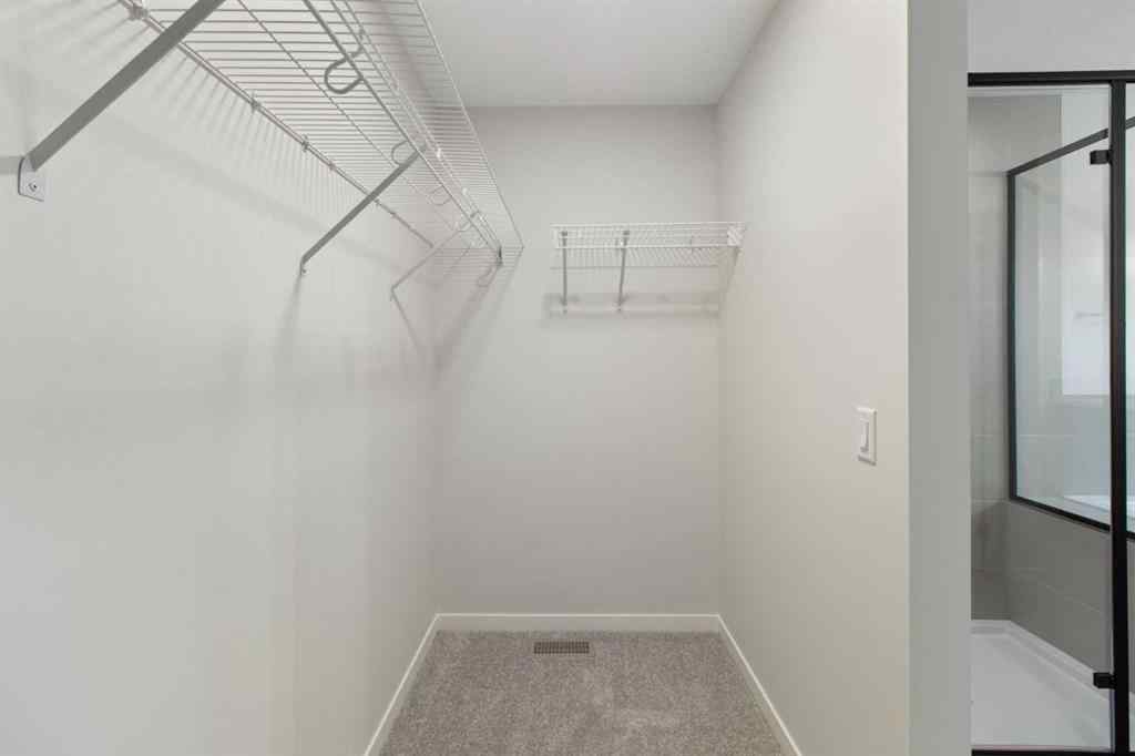 MLS® A2263502 - 164 Belmont Place SW in Belmont Calgary, Residential