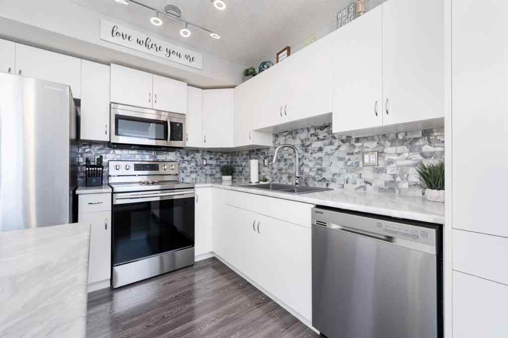 MLS® A2263510 - Unit #310 50 Westland Road  in NONE Okotoks, Residential