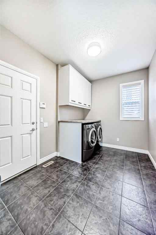 MLS® A2263524 - 173 Aspenshire Drive SW in Aspen Woods Calgary, Residential