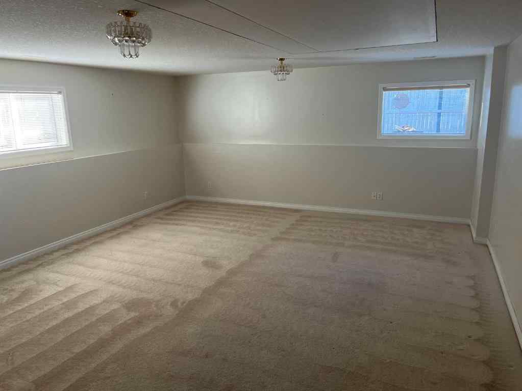 MLS® A2263537 - 64 Ermineview Way N in Uplands Lethbridge, Residential