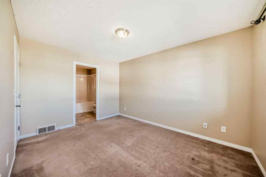 MLS® A2263565 - 50 Everridge Gardens SW in Evergreen Calgary, Residential