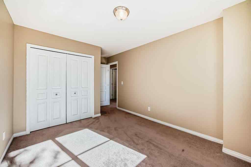 MLS® A2263565 - 50 Everridge Gardens SW in Evergreen Calgary, Residential