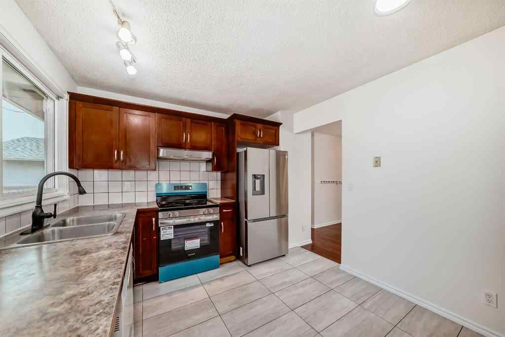 MLS® A2263574 - 176 Pinecliff Way NE in Pineridge Calgary, Residential