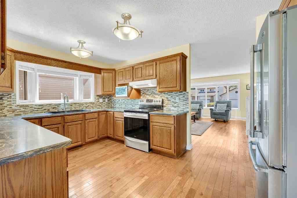 MLS® A2263593 - 32 Rideau Close SW in Ridgegate Airdrie, Residential