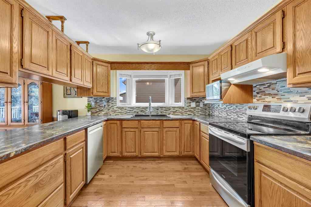 MLS® A2263593 - 32 Rideau Close SW in Ridgegate Airdrie, Residential