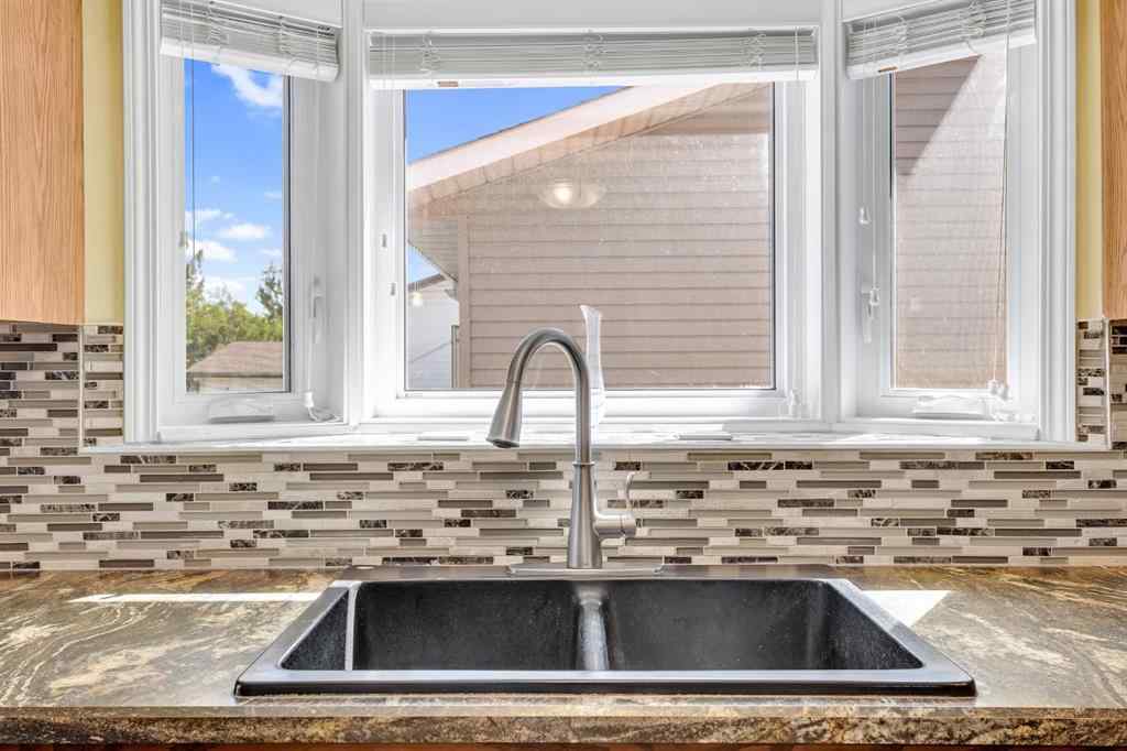 MLS® A2263593 - 32 Rideau Close SW in Ridgegate Airdrie, Residential