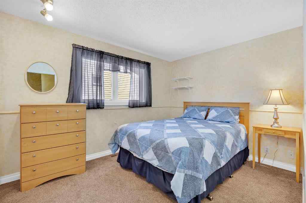 MLS® A2263593 - 32 Rideau Close SW in Ridgegate Airdrie, Residential