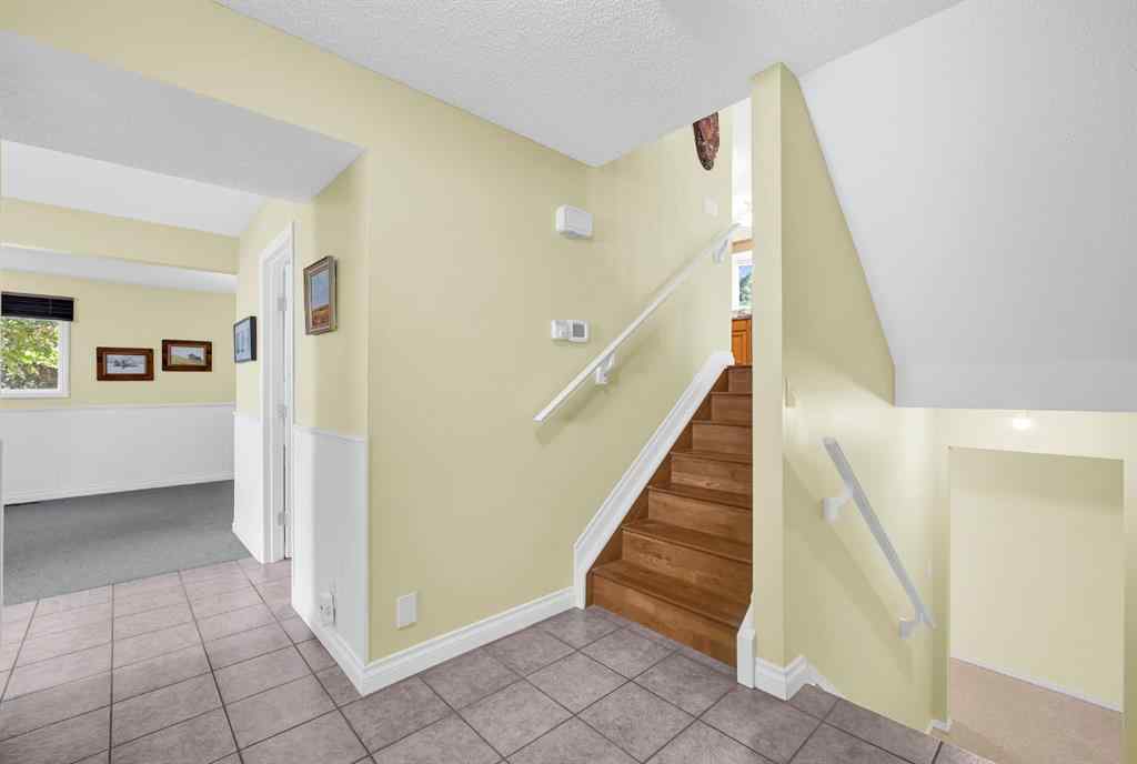 MLS® A2263593 - 32 Rideau Close SW in Ridgegate Airdrie, Residential