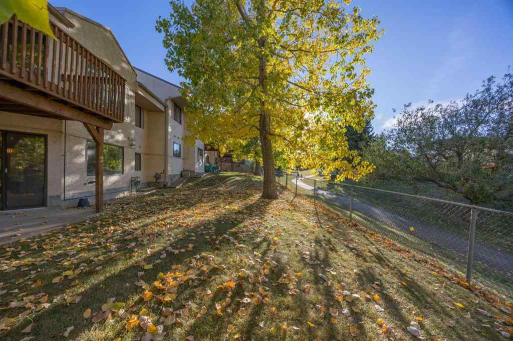 MLS® A2263600 - 52 Sandarac Circle NW in Sandstone Valley Calgary, Residential