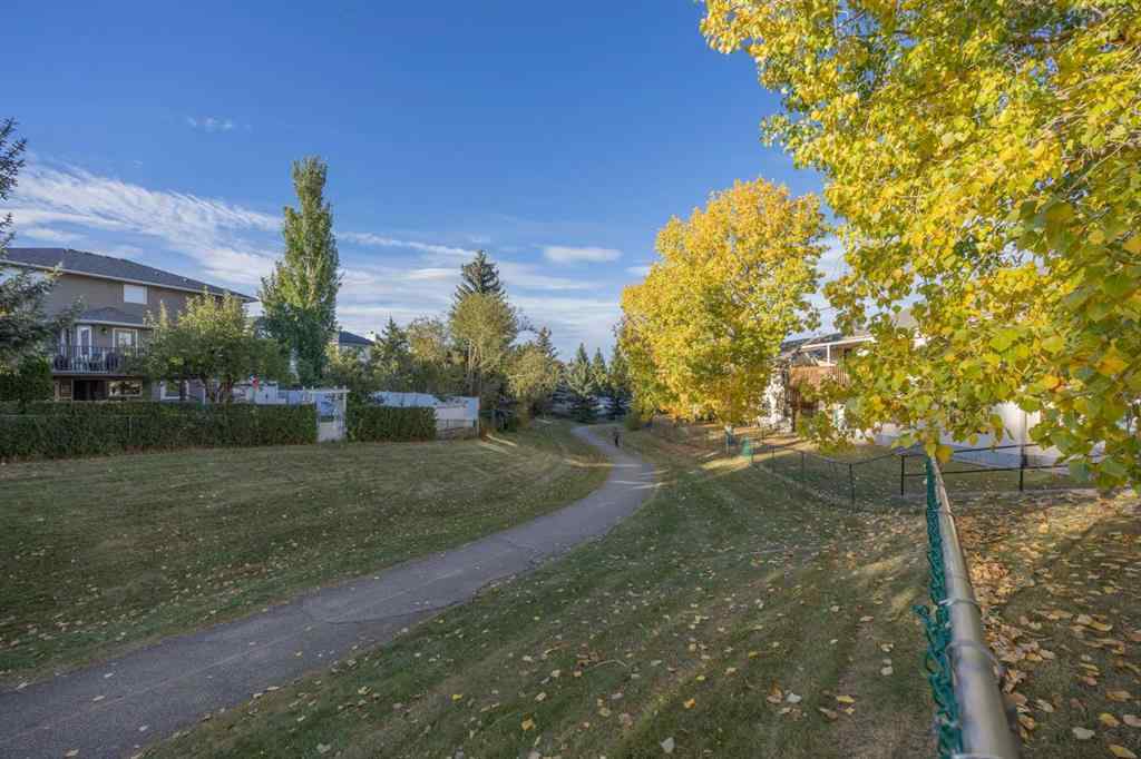 MLS® A2263600 - 52 Sandarac Circle NW in Sandstone Valley Calgary, Residential