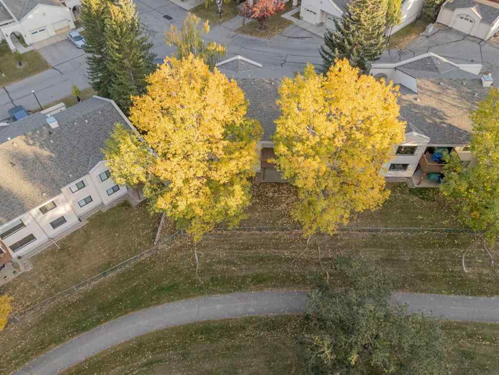 MLS® A2263600 - 52 Sandarac Circle NW in Sandstone Valley Calgary, Residential
