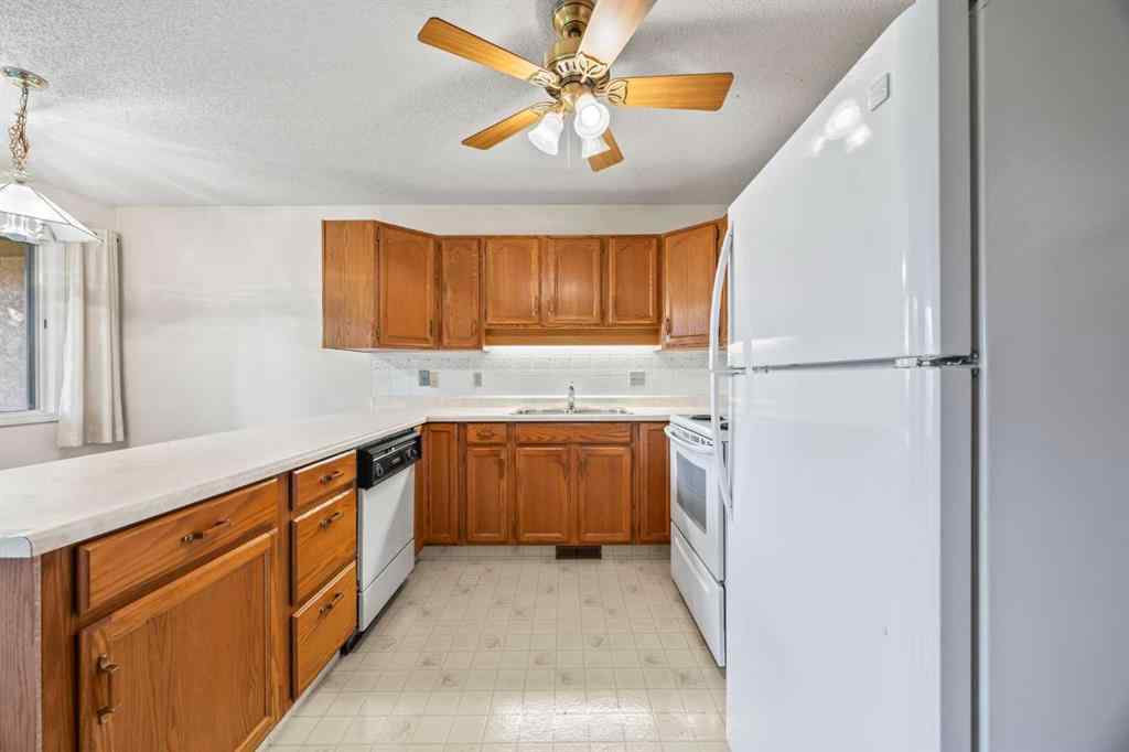 MLS® A2263600 - 52 Sandarac Circle NW in Sandstone Valley Calgary, Residential