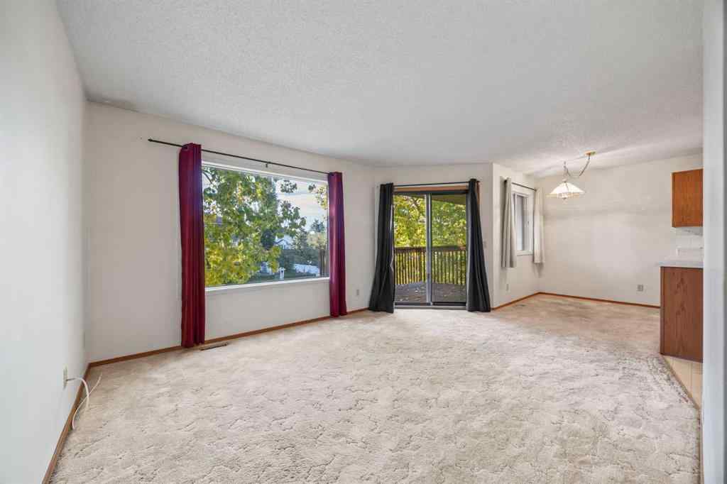 MLS® A2263600 - 52 Sandarac Circle NW in Sandstone Valley Calgary, Residential