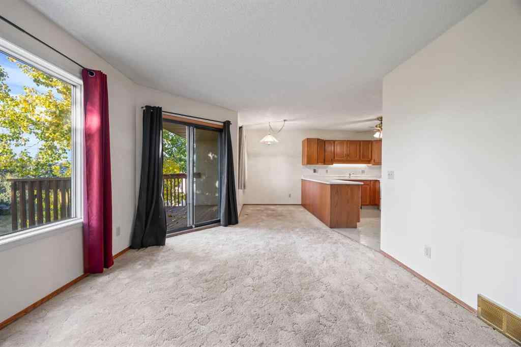 MLS® A2263600 - 52 Sandarac Circle NW in Sandstone Valley Calgary, Residential