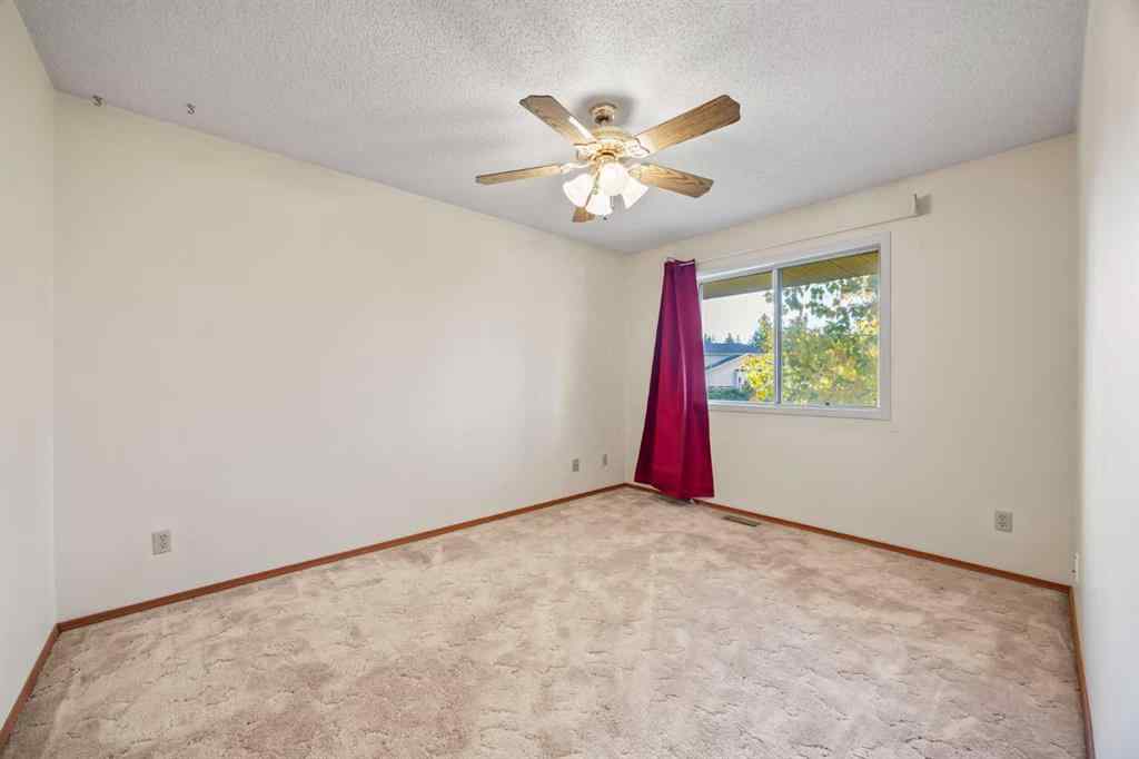 MLS® A2263600 - 52 Sandarac Circle NW in Sandstone Valley Calgary, Residential