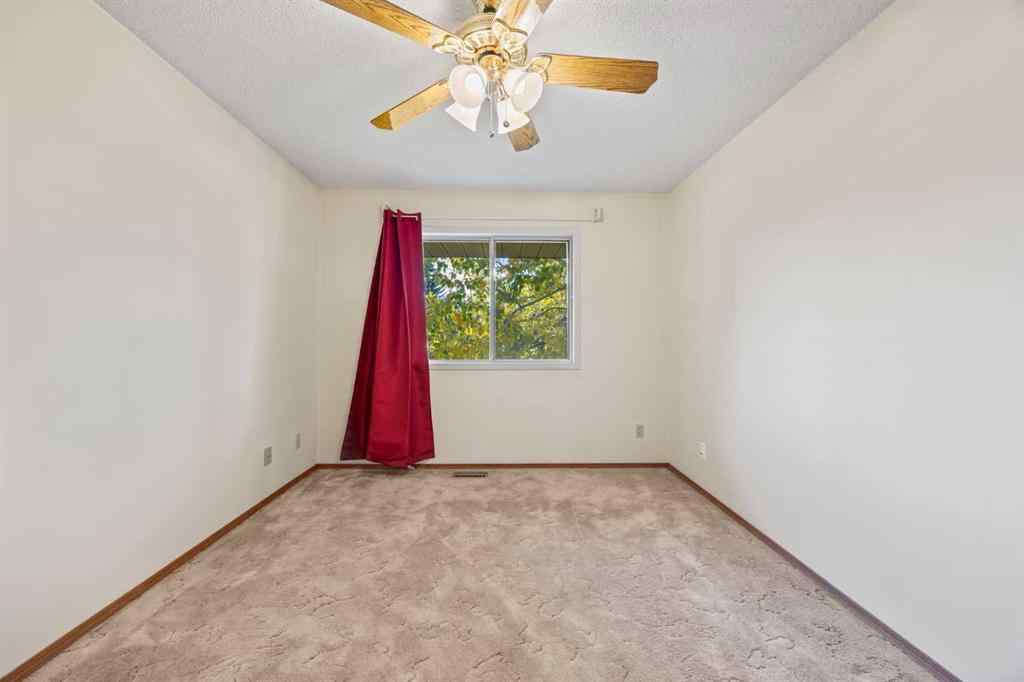 MLS® A2263600 - 52 Sandarac Circle NW in Sandstone Valley Calgary, Residential