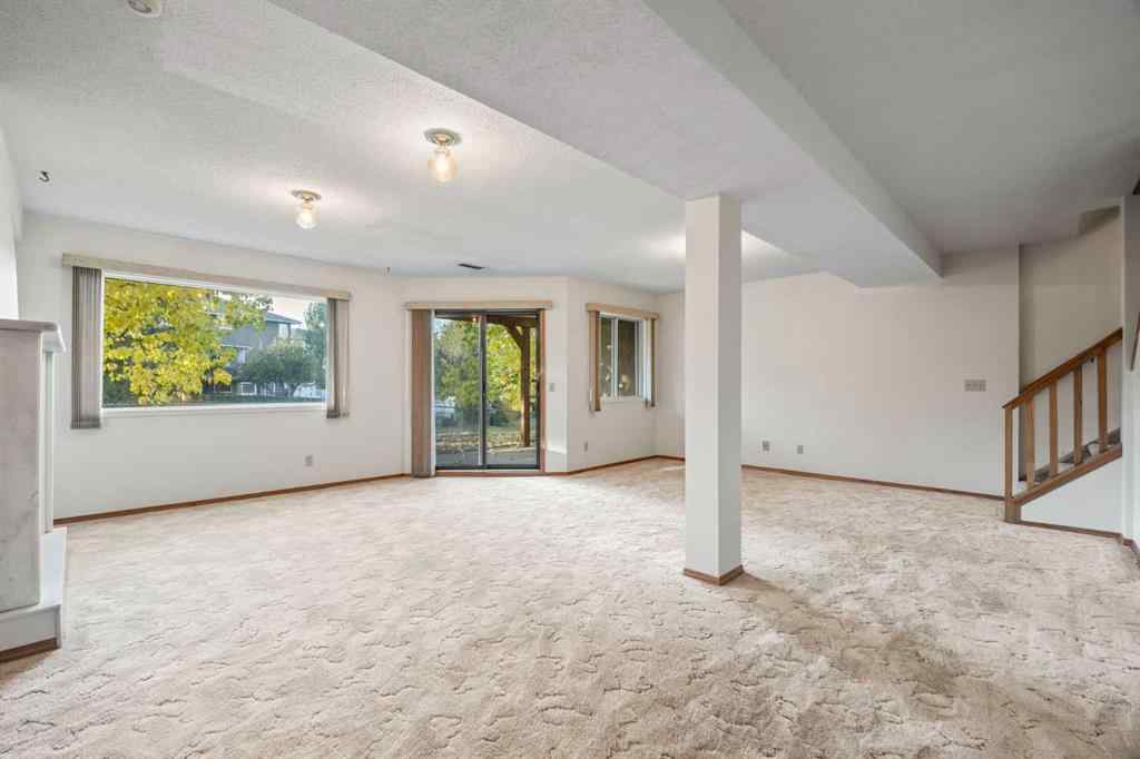 MLS® A2263600 - 52 Sandarac Circle NW in Sandstone Valley Calgary, Residential