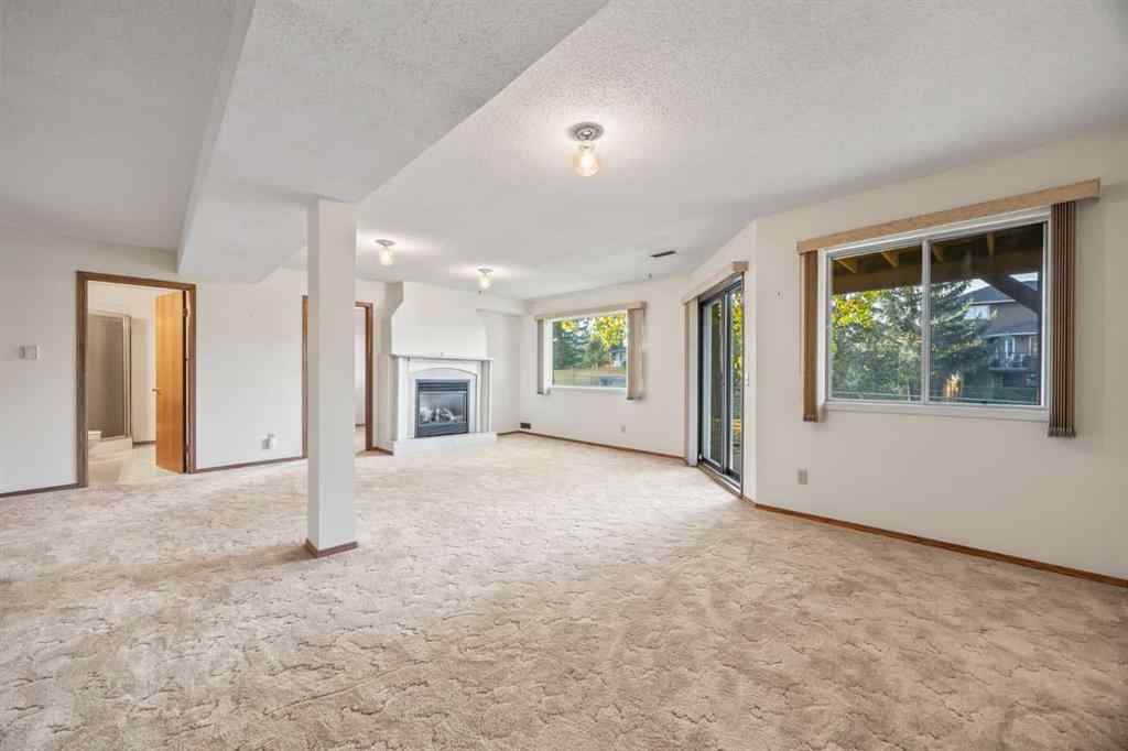 MLS® A2263600 - 52 Sandarac Circle NW in Sandstone Valley Calgary, Residential