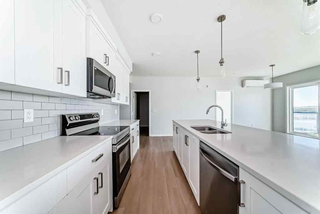 MLS® A2263615 - Unit #1305 42 Cranbrook Gardens SE in Cranston Calgary, Residential