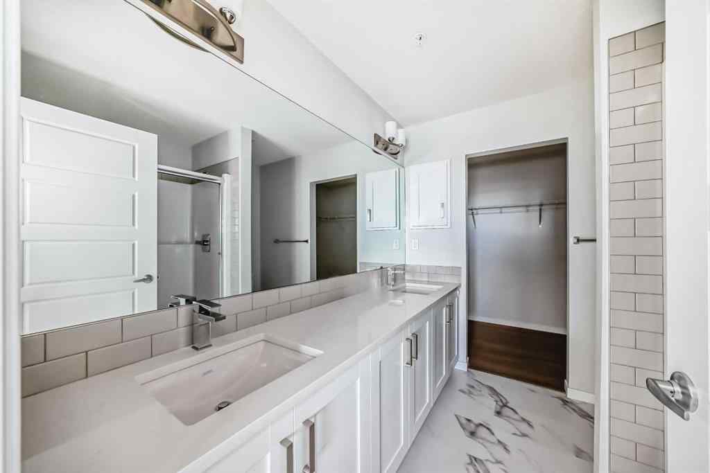 MLS® A2263615 - Unit #1305 42 Cranbrook Gardens SE in Cranston Calgary, Residential