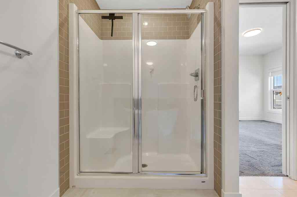 MLS® A2263620 - 211 Creekstone Row SW in Pine Creek Calgary, Residential