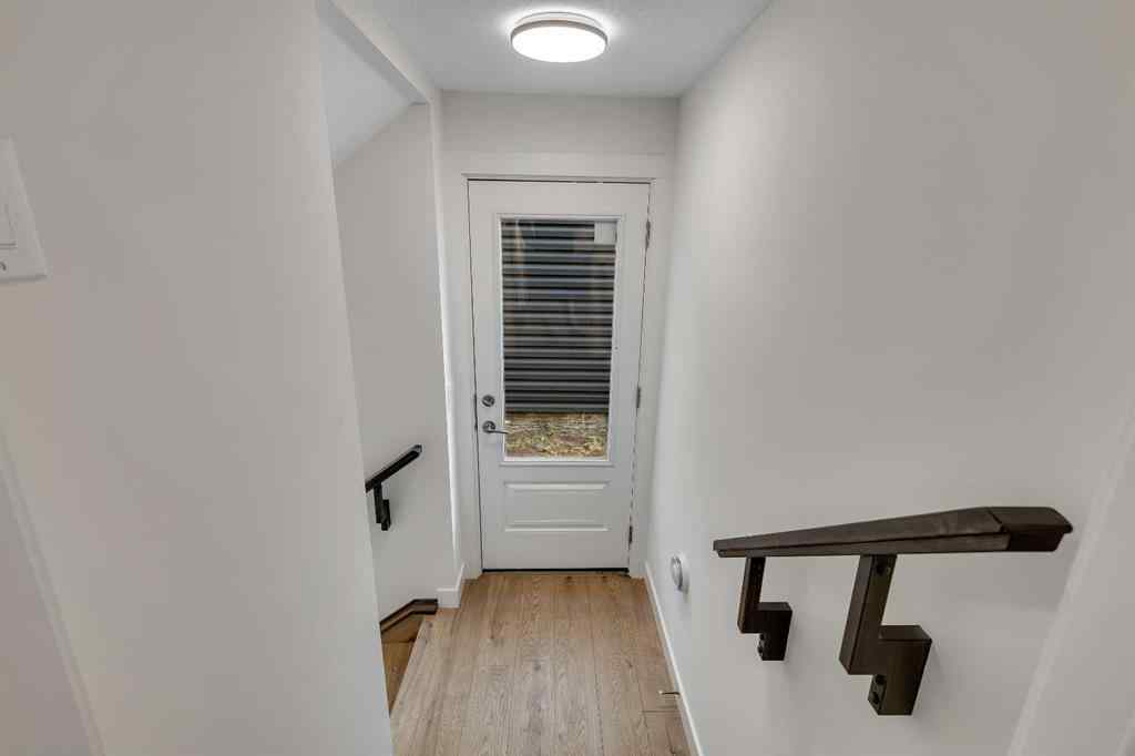 MLS® A2263620 - 211 Creekstone Row SW in Pine Creek Calgary, Residential