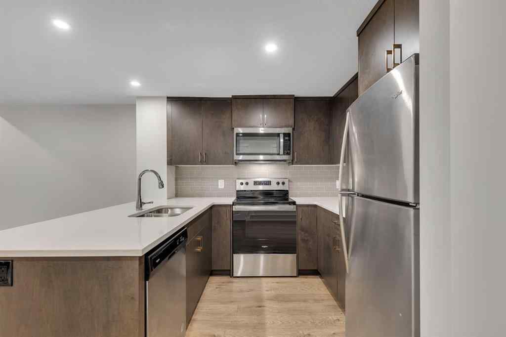 MLS® A2263620 - 211 Creekstone Row SW in Pine Creek Calgary, Residential