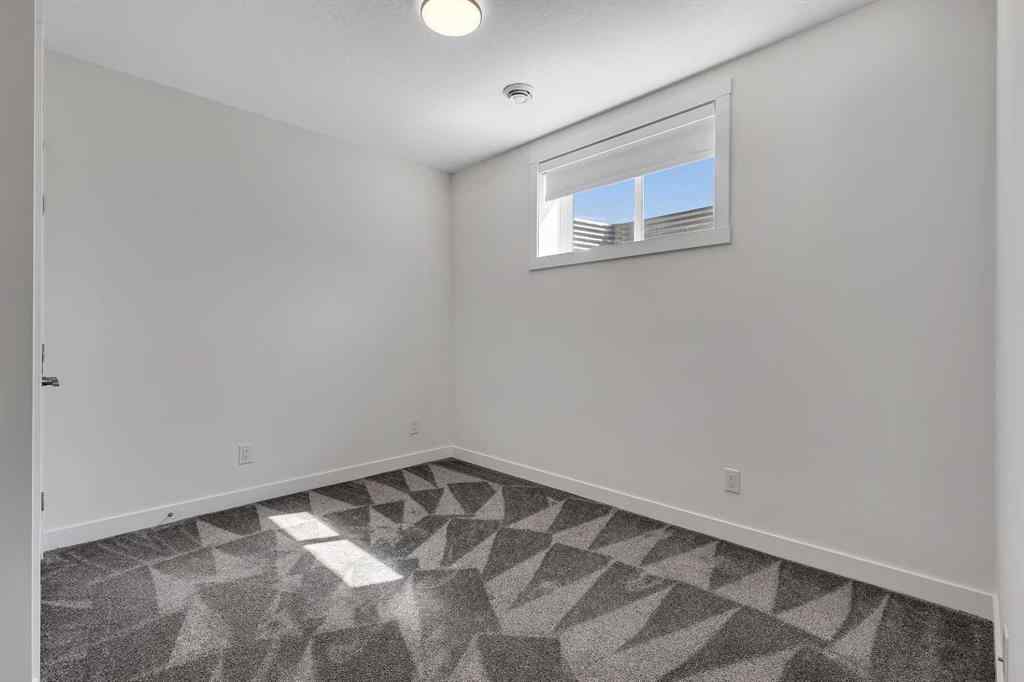 MLS® A2263620 - 211 Creekstone Row SW in Pine Creek Calgary, Residential