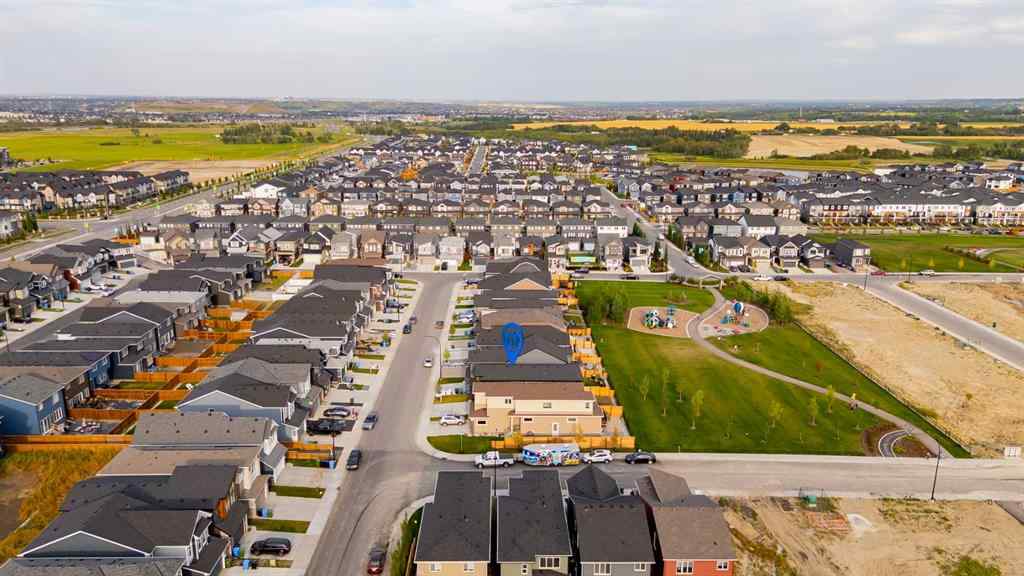 MLS® A2263620 - 211 Creekstone Row SW in Pine Creek Calgary, Residential