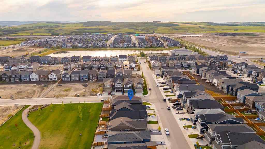 MLS® A2263620 - 211 Creekstone Row SW in Pine Creek Calgary, Residential