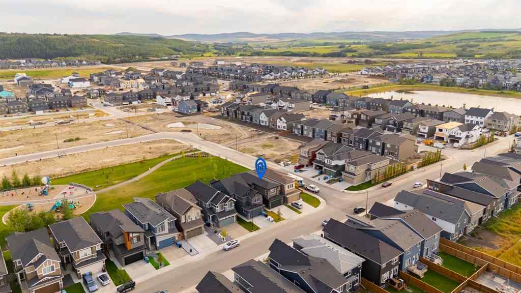 MLS® A2263620 - 211 Creekstone Row SW in Pine Creek Calgary, Residential