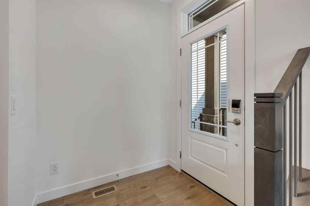 MLS® A2263620 - 211 Creekstone Row SW in Pine Creek Calgary, Residential