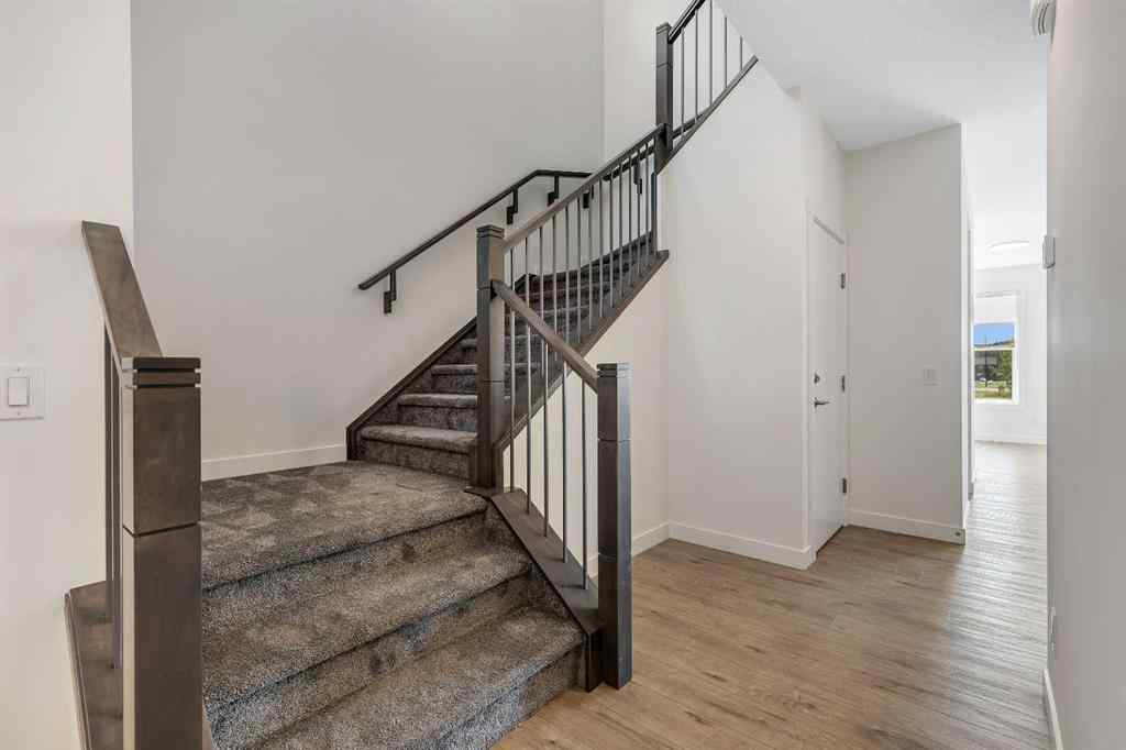 MLS® A2263620 - 211 Creekstone Row SW in Pine Creek Calgary, Residential