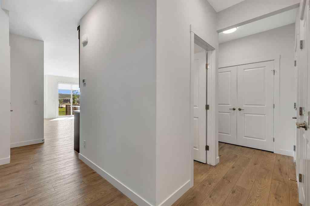 MLS® A2263620 - 211 Creekstone Row SW in Pine Creek Calgary, Residential