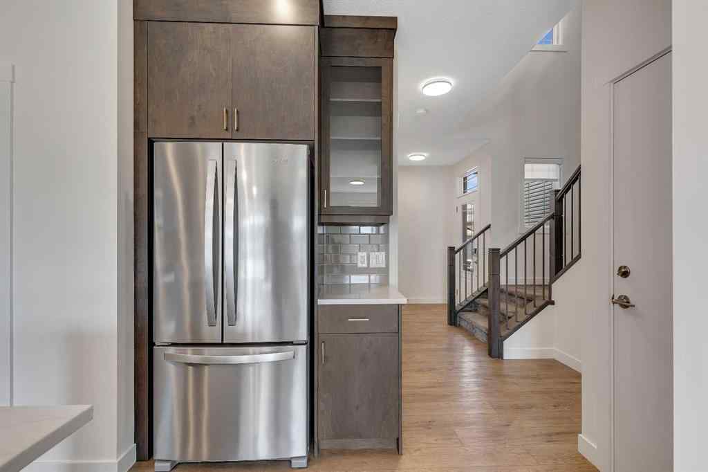 MLS® A2263620 - 211 Creekstone Row SW in Pine Creek Calgary, Residential