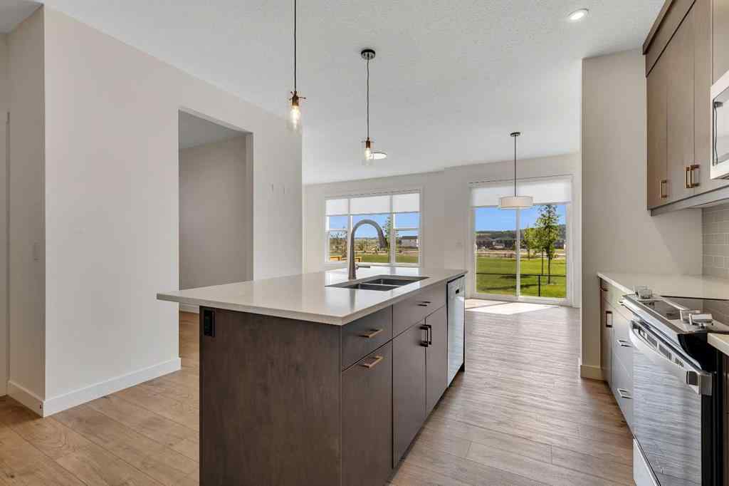 MLS® A2263620 - 211 Creekstone Row SW in Pine Creek Calgary, Residential