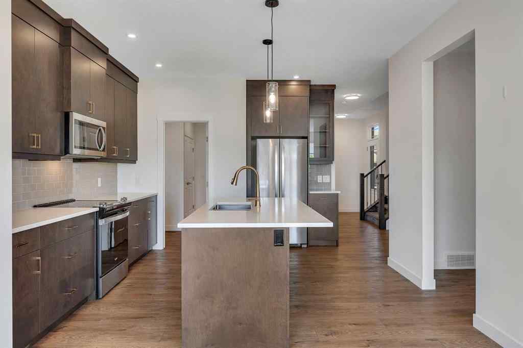 MLS® A2263620 - 211 Creekstone Row SW in Pine Creek Calgary, Residential