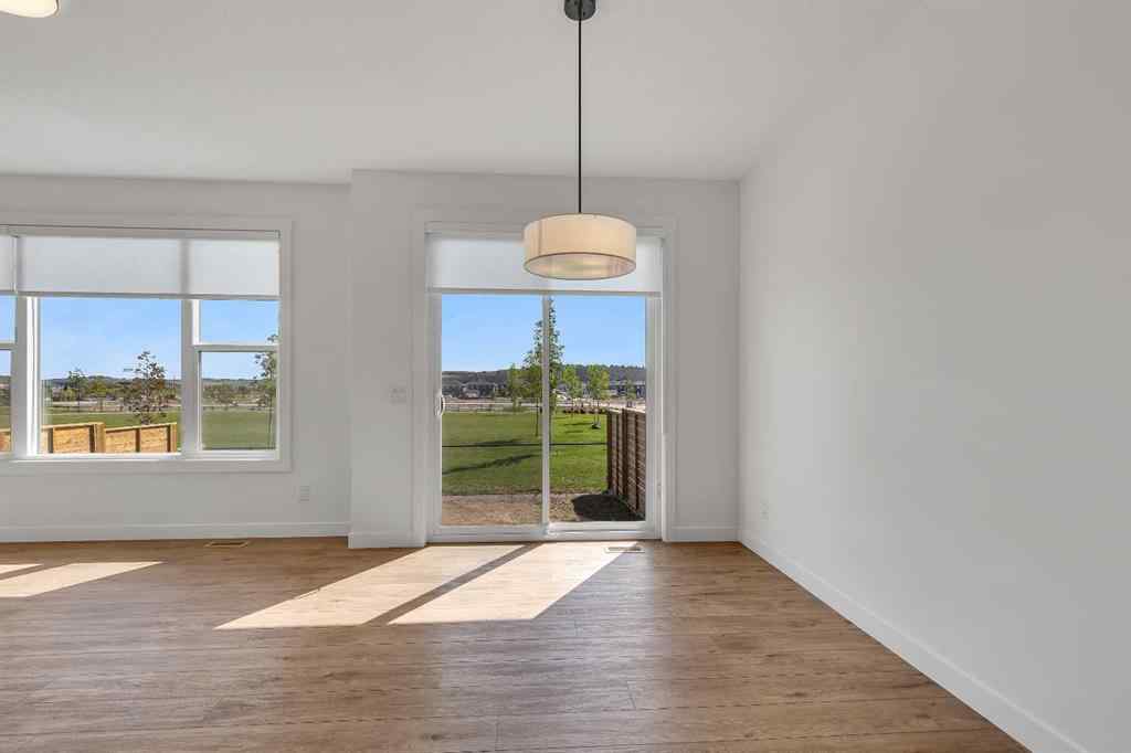 MLS® A2263620 - 211 Creekstone Row SW in Pine Creek Calgary, Residential