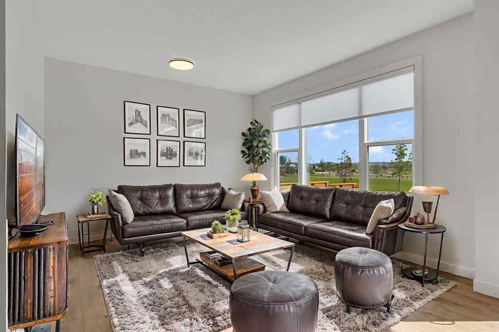 MLS® A2263620 - 211 Creekstone Row SW in Pine Creek Calgary, Residential