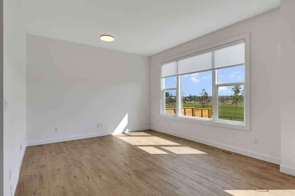 MLS® A2263620 - 211 Creekstone Row SW in Pine Creek Calgary, Residential